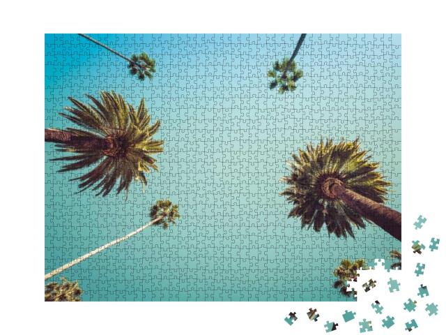Puzzle 1000 Teile „Blauer Himmel über Palmen“