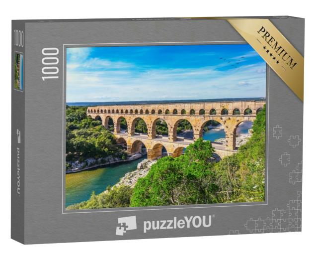 Puzzle 1000 Teile „Das dreistufige Aquädukt Pont du Gard wurde in römischer Zeit am Fluss Gardon gebaut“