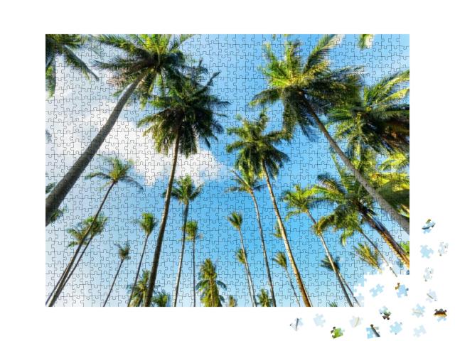 Puzzle 1000 Teile „Blick nach oben zwischen Palmen“