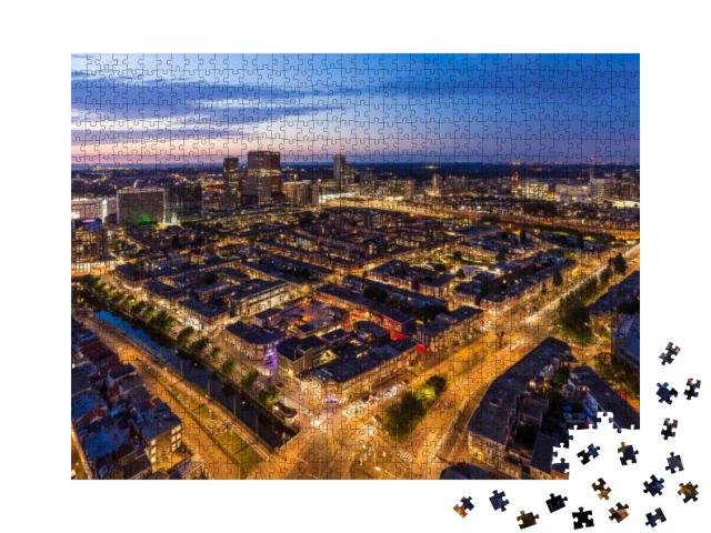 Puzzle 1000 Teile „Den Haag Skyline von oben bei Dämmerung, Niederlande“