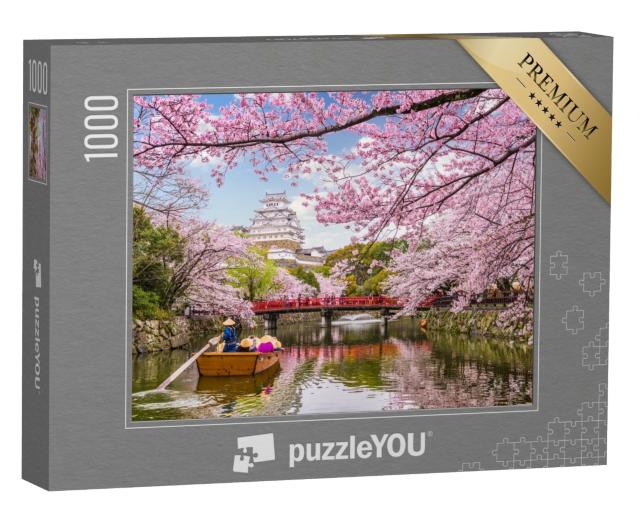 Puzzle 1000 Teile „Majestätische Burg über der Stadt Himeji während der Kirschblüte in Japan“