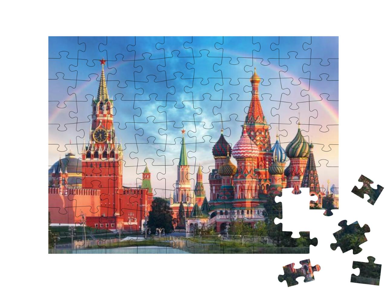 Puzzle 100 Teile „Panoramablick auf den Roten Platz mit Moskauer Kreml und Regenbogen“