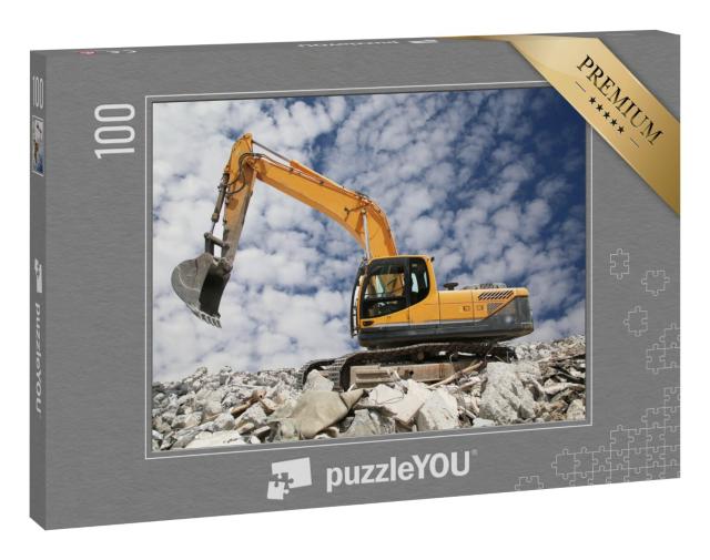 Puzzle 100 Teile „Bagger gräbt im Boden für das Fundament“