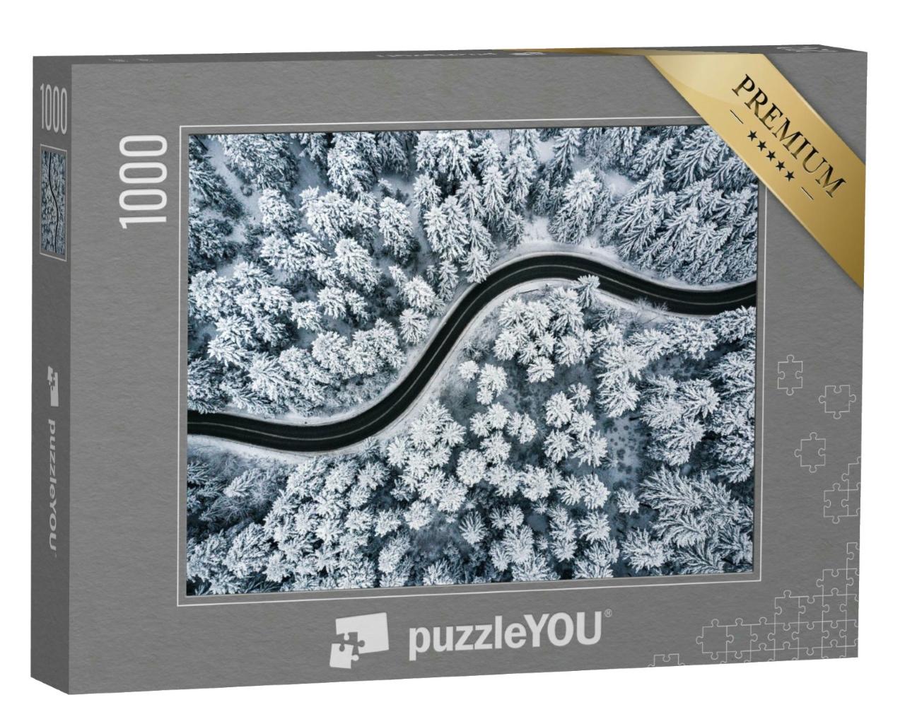 Puzzle 1000 Teile „Kurvenreiche Straße im schneebedeckten Wald“