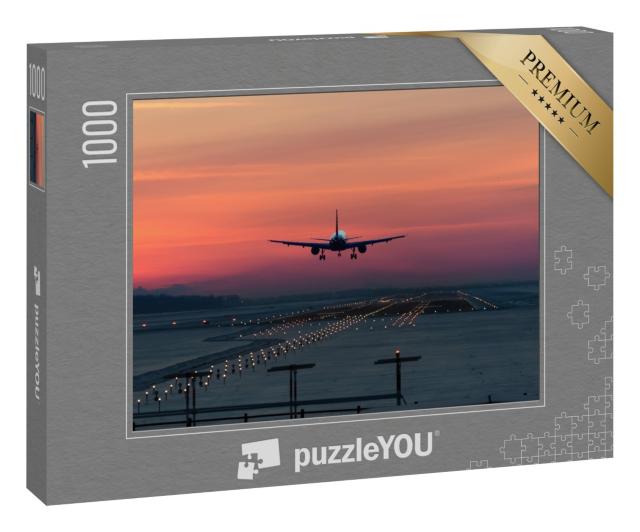 Puzzle 1000 Teile „Flugzeug im Landeanflug am frühen Morgen“