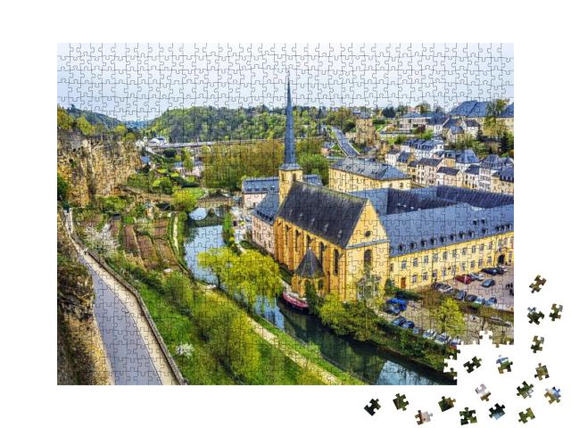 Puzzle 1000 Teile „Panoramablick auf Luxemburg mit Fluss Alzette und Kirche St. Jean du Grund“