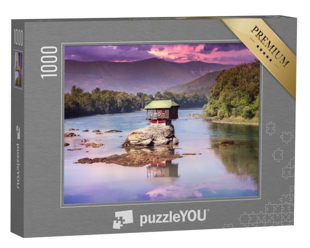 Puzzle 1000 Teile „Buntes kleines Haus auf dem Felsen in der Mitte des Flusses Drina, Serbien“