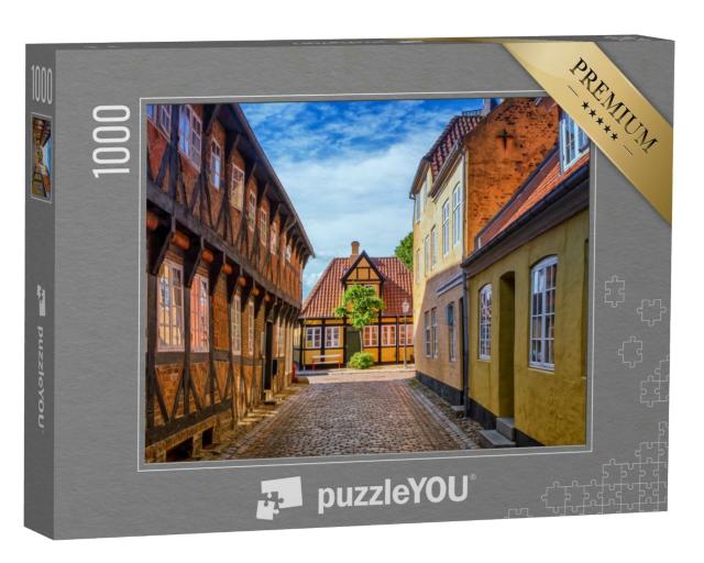 Puzzle 1000 Teile „Straße und Häuser der mittelalterlichen Stadt Ribe in Dänemark“