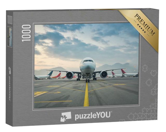 Puzzle 1000 Teile „Passagierflugzeug auf dem internationalen Flughafens Hongkong“