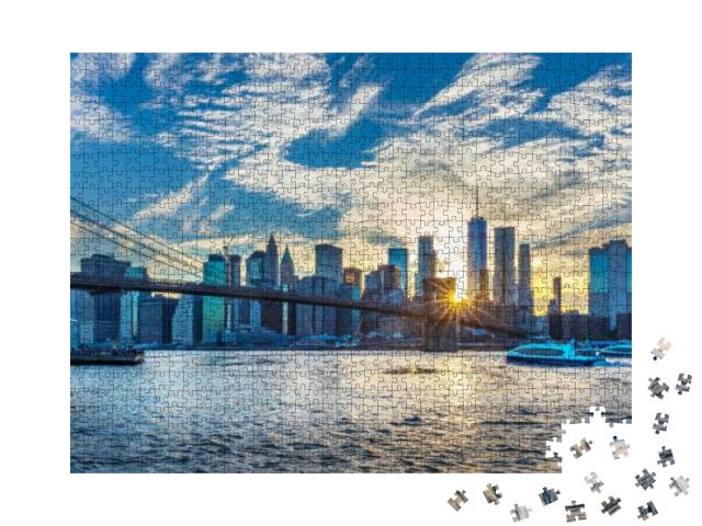 Puzzle 1000 Teile „Blick auf die Manhattan Skyline vom Brooklyn Bridge Park“