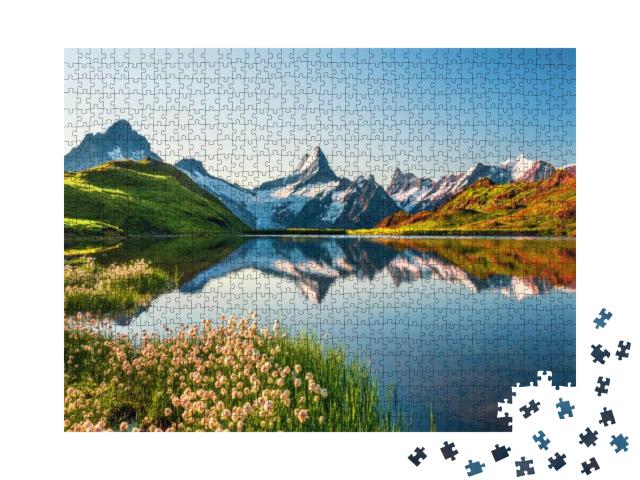 Puzzle 1000 Teile „Berner Bergkette mit Eiger und Jungfrau, Schweiz Alpen, Grindelwald Tal“
