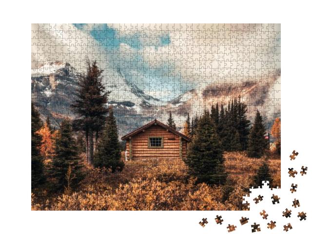 Puzzle 1000 Teile „Holzhütte auf dem Assiniboine-Berg im Herbstwald, Kanada“