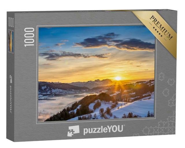 Puzzle 1000 Teile „Winterlandschaft bei Sonnenuntergang über den Bregenzer Wald“