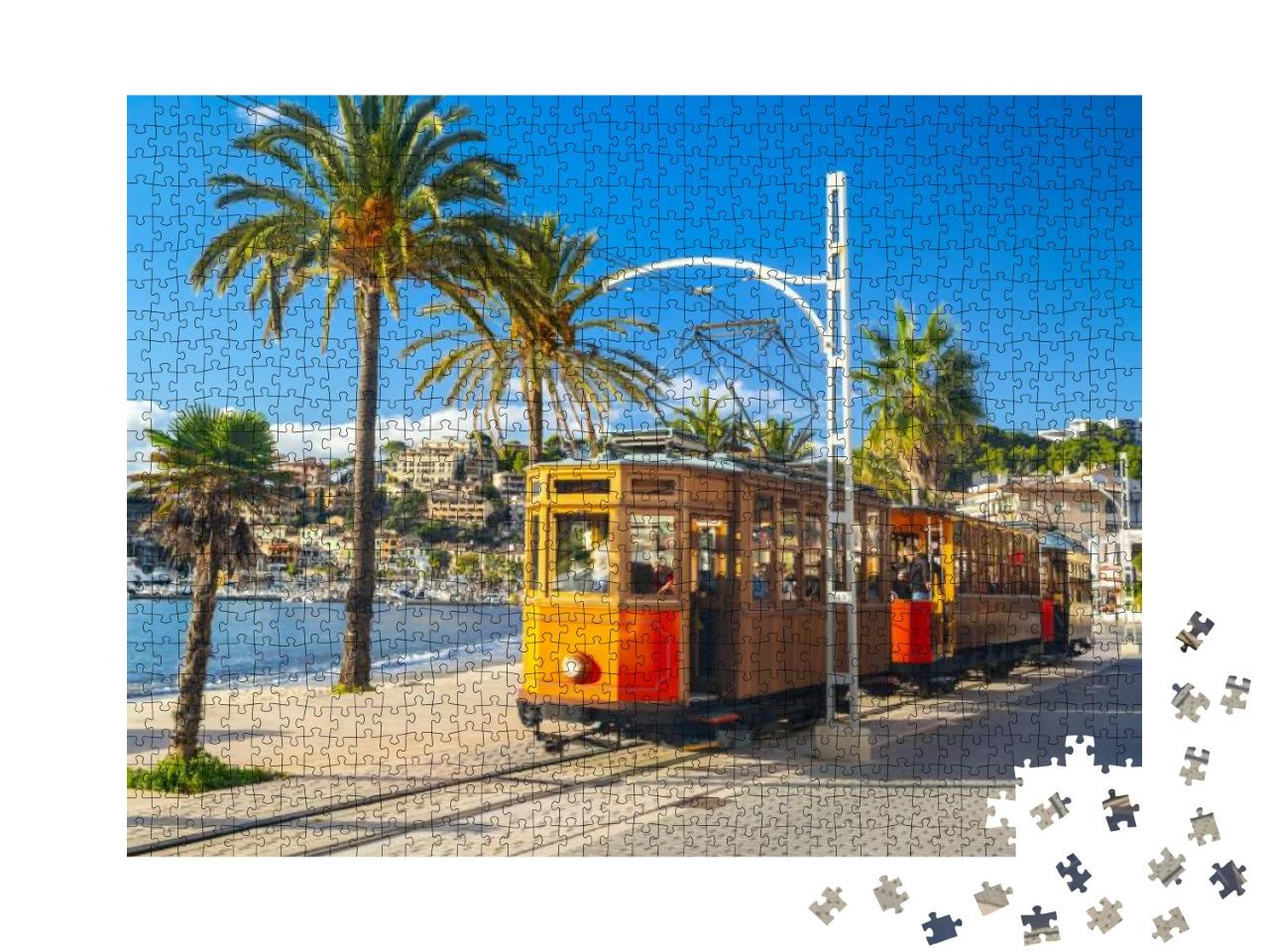 Puzzle 1000 Teile „Straßenbahn fährt von Soller nach Port de Soller, Mallorca, Spanien“