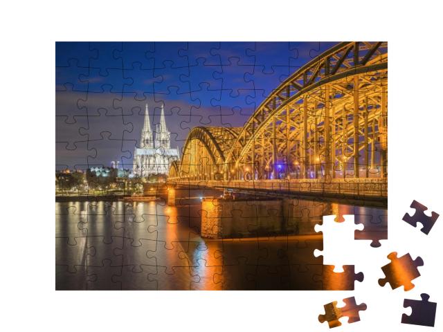 Puzzle 100 Teile „Nachtansicht des Kölner Doms in Köln, Deutschland“