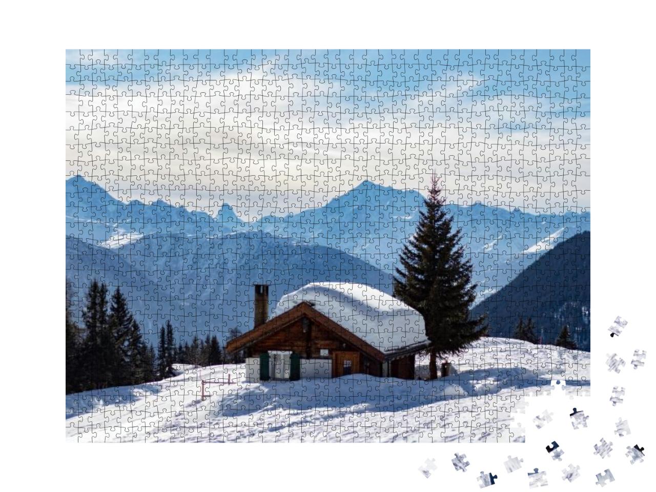 Puzzle 1000 Teile „Verschneite Berghütte in den Schweizer Alpen“