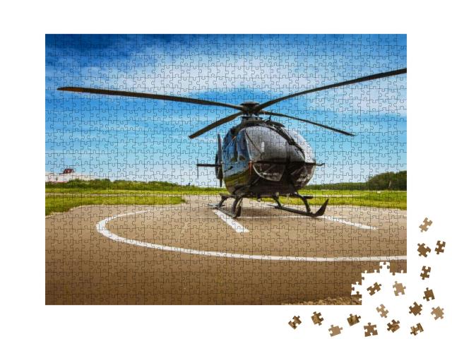 Puzzle 1000 Teile „Hubschrauber auf dem Hubschrauberlandeplatz“