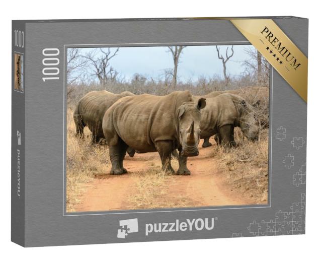 Puzzle 1000 Teile „Eine Herde Breitmaulnashörner im Hlane Royal National Park, Swasiland“