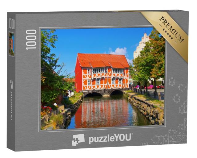 Puzzle 1000 Teile „Die Altstadt von Wismar in Norddeutschland, das rote Haus“