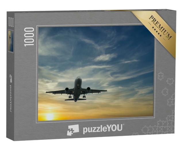 Puzzle 1000 Teile „Flugzeug vor dem blauen Himmel im Sonnenuntergang“