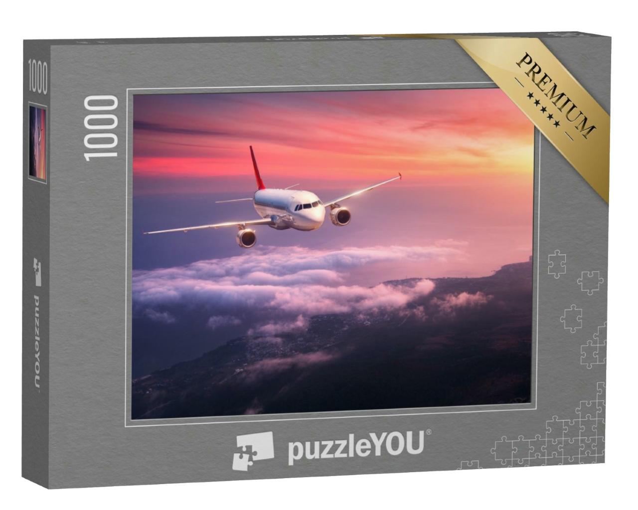 Puzzle 1000 Teile „Passagierflugzeug beim Flug durch den roten Abendhimmel“