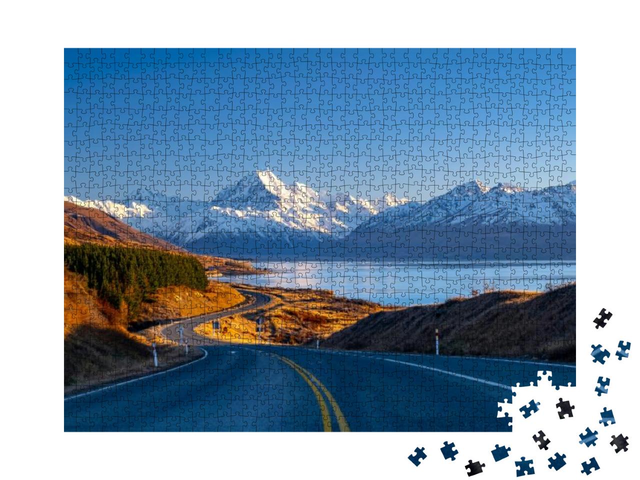 Puzzle 1000 Teile „Straße entlang des Lake Pukaki zum Mount Cook National Park, Neuseeland“