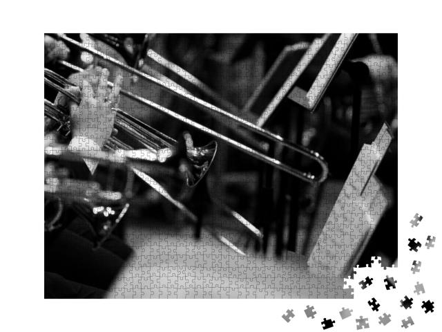 Puzzle 1000 Teile „Ein Trompetenspieler an seinem Instrument“