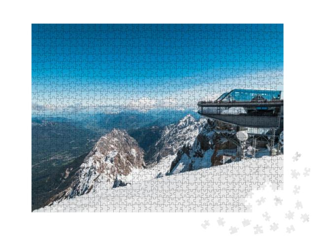 Puzzle 1000 Teile „Auf dem Gipfel der Zugspitze, dem höchsten Berg Deutschlands“