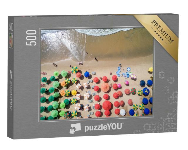Puzzle 500 Teile „Luftaufnahme von einem Sandstrand mit Sonnenschirmen“