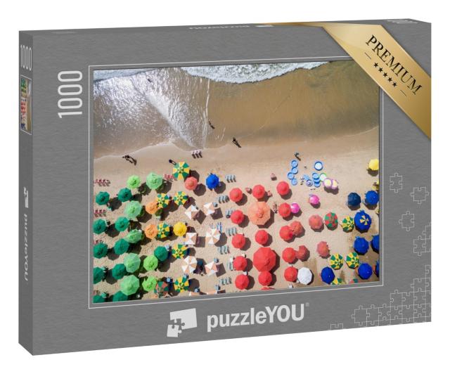 Puzzle 1000 Teile „Luftaufnahme von einem Sandstrand mit Sonnenschirmen“
