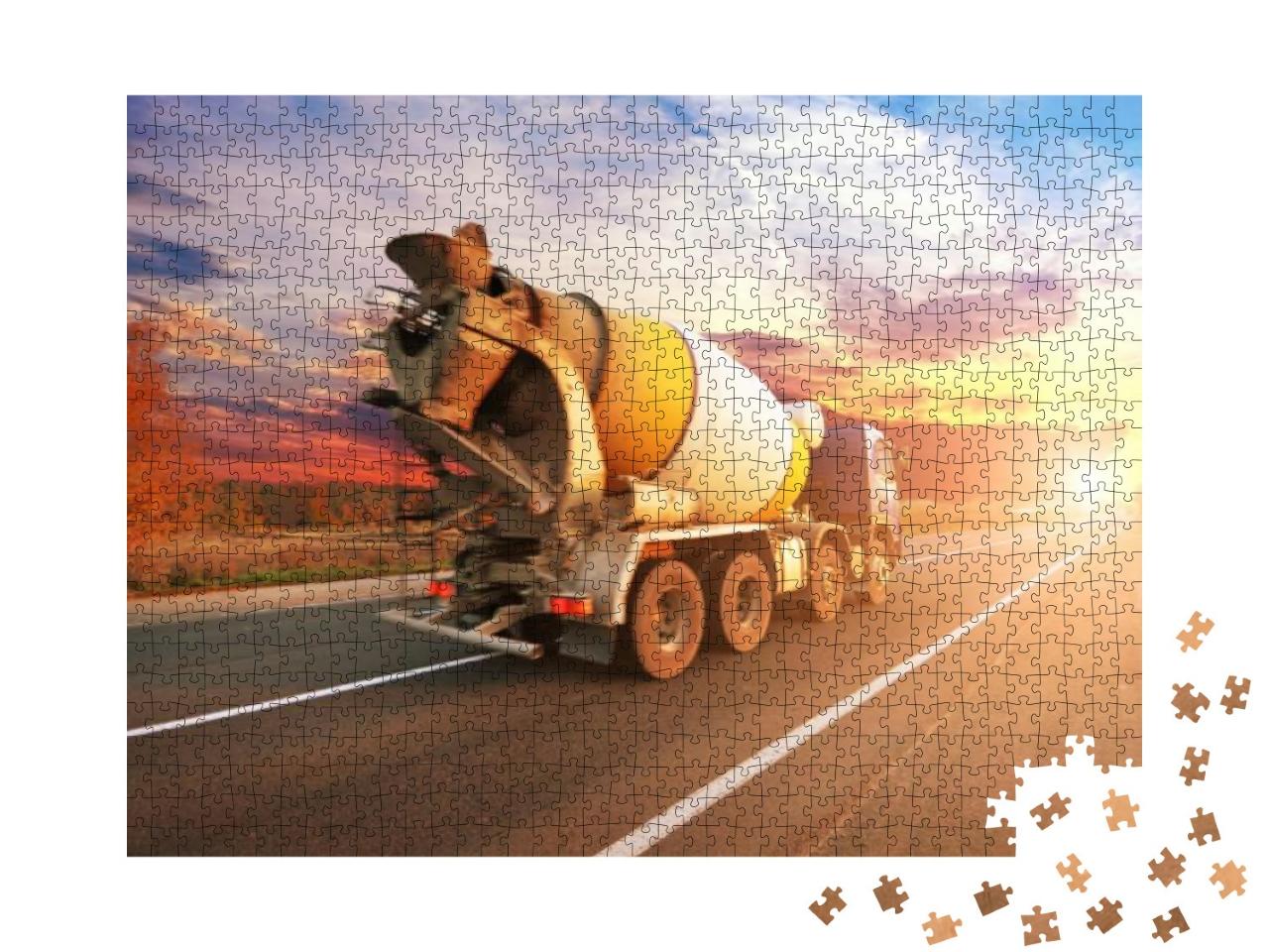 Puzzle 1000 Teile „Betonmischer auf der Straße im Sonnenuntergang“