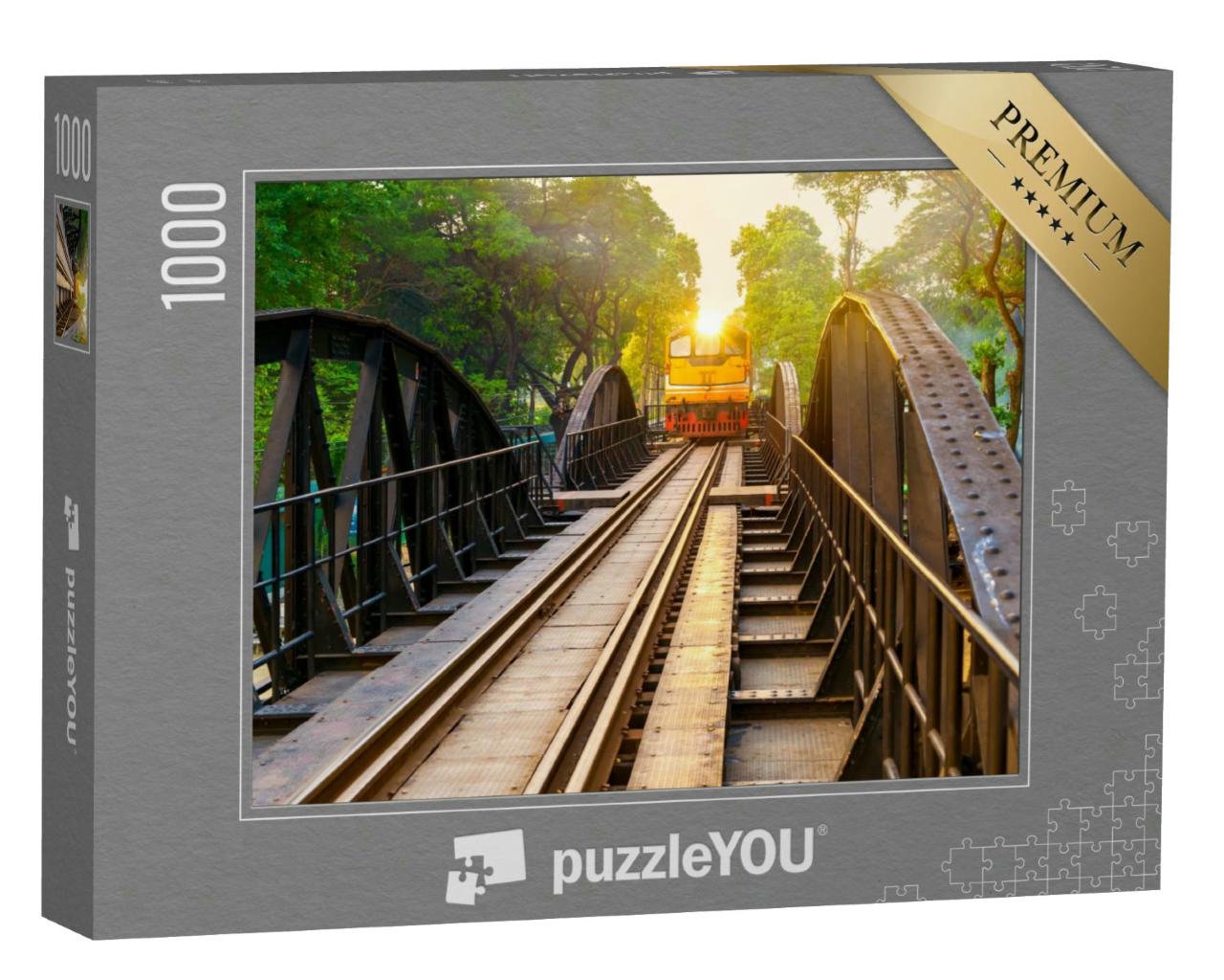 Puzzle 1000 Teile „Alter Zug auf der Brücke am Fluss Kwai in Kanchanaburi, Thailand“