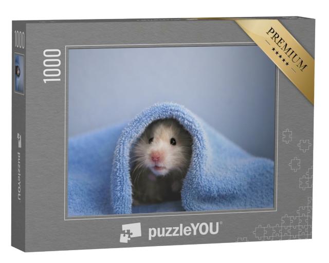 Puzzle 1000 Teile „Ein Hamster in einem kuscheligen blauen Handtuch“