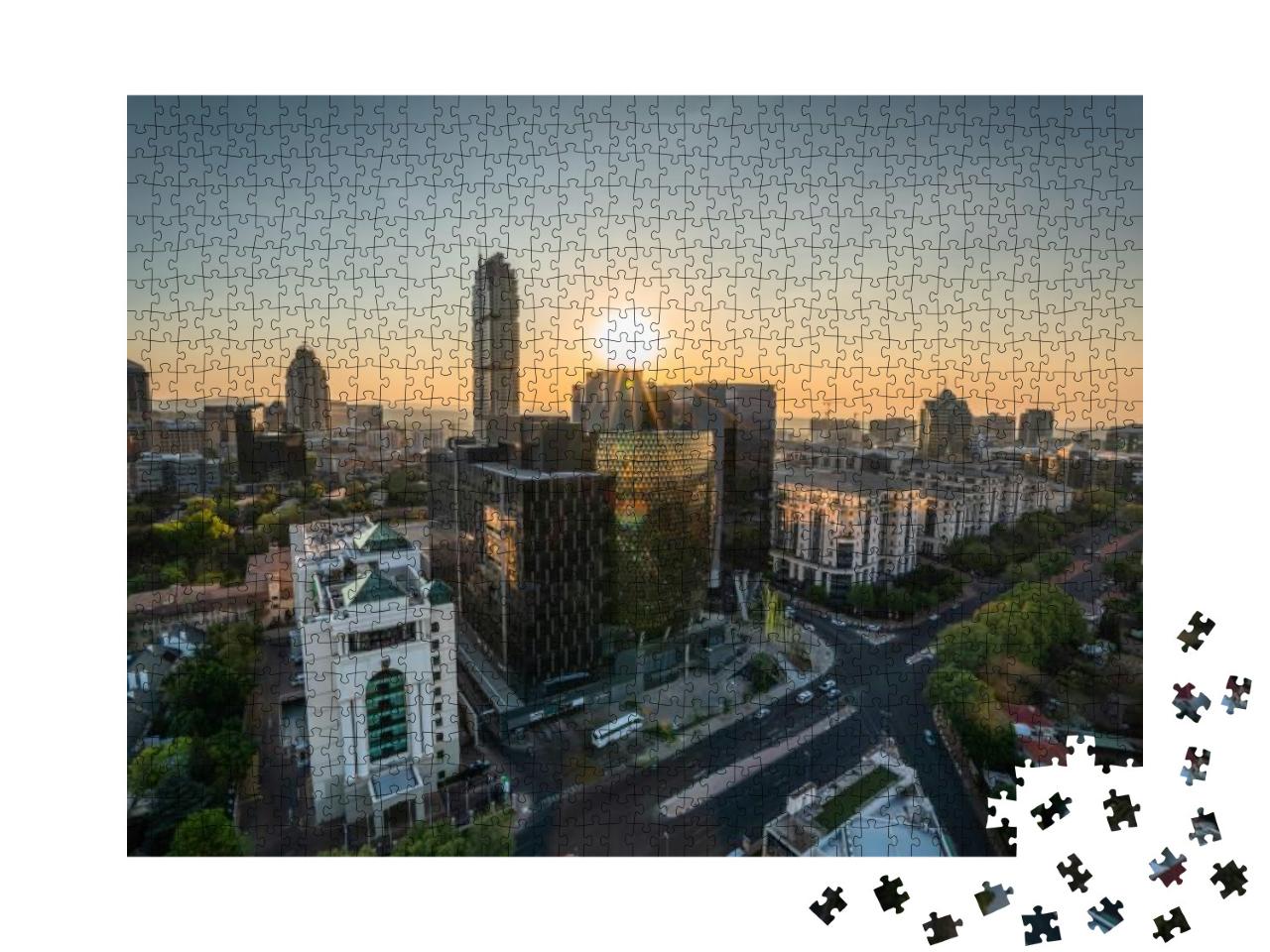 Puzzle 1000 Teile „Moderne Gebäude mit Stahl und Glas im Sonnenuntergang, Johannesburg, Südafrika“