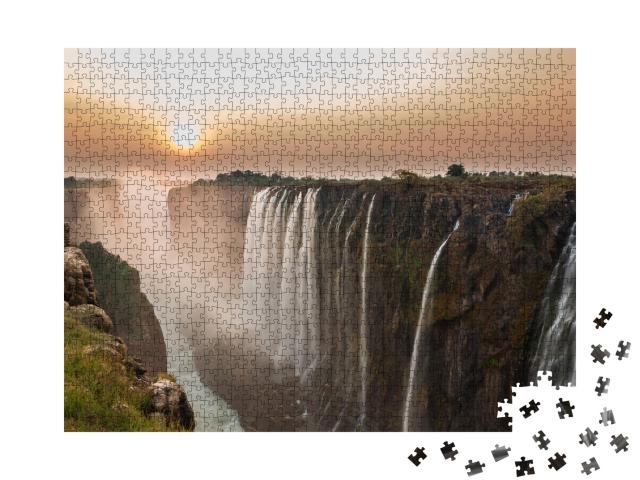 Puzzle 1000 Teile „Victoria Falls im Sonnenuntergang, Blick aus Sambia“